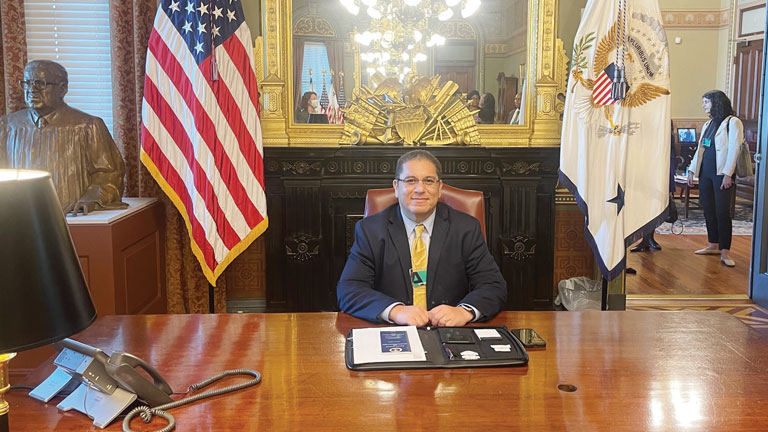 Elwany, a frequent speaker at government meetings, sits at a desk at Vice President Kamala Harris’ Ceremonial Office in the Eisenhower Executive Office Building.