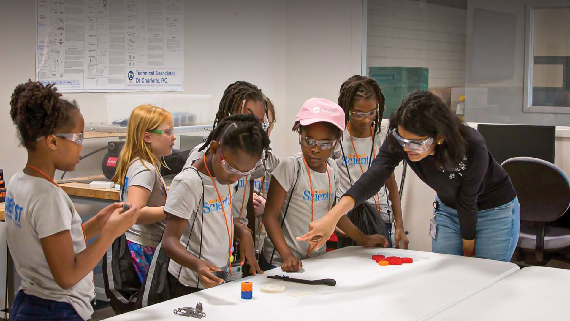 Rashmi Vadlakonda explains 3D-printing technology to Project Scientist girls who visited Trane Technologies corporate headquarters in North Carolina.