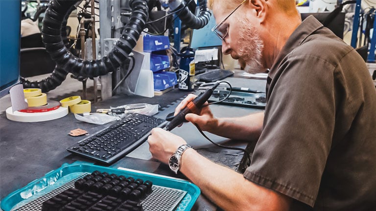 Automation has streamlined many of the post-processing operations common to 3D printing, yet the need for skilled labor isn’t going away anytime soon. (Photo provided by Protolabs)