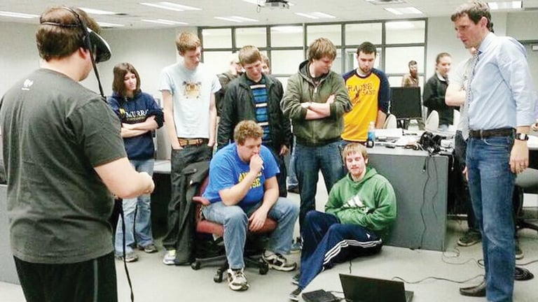 Hands-on experiences are an important part of Rustin Webster’s (far right) teaching curriculum at Purdue University.